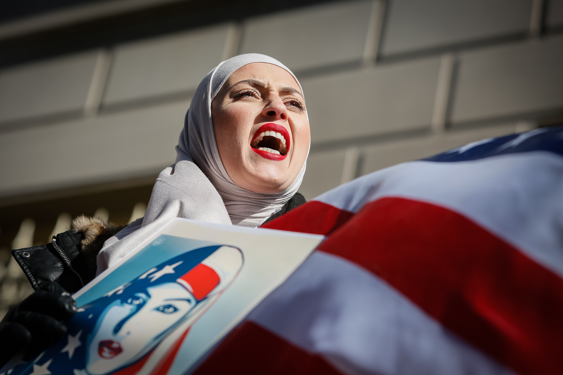 A demonstrator chants during a protest of a Trump-administration immigration ban near the White House in Washington, D.C., Feb. 4, 2017. The ban, which blocked immigrants from seven Muslim-majority countries and suspended the U.S. refugee program, was lifted the same day by a federal court and the administration vowed to appeal the ruling. (© 2017 Eric Dietrich Photography)