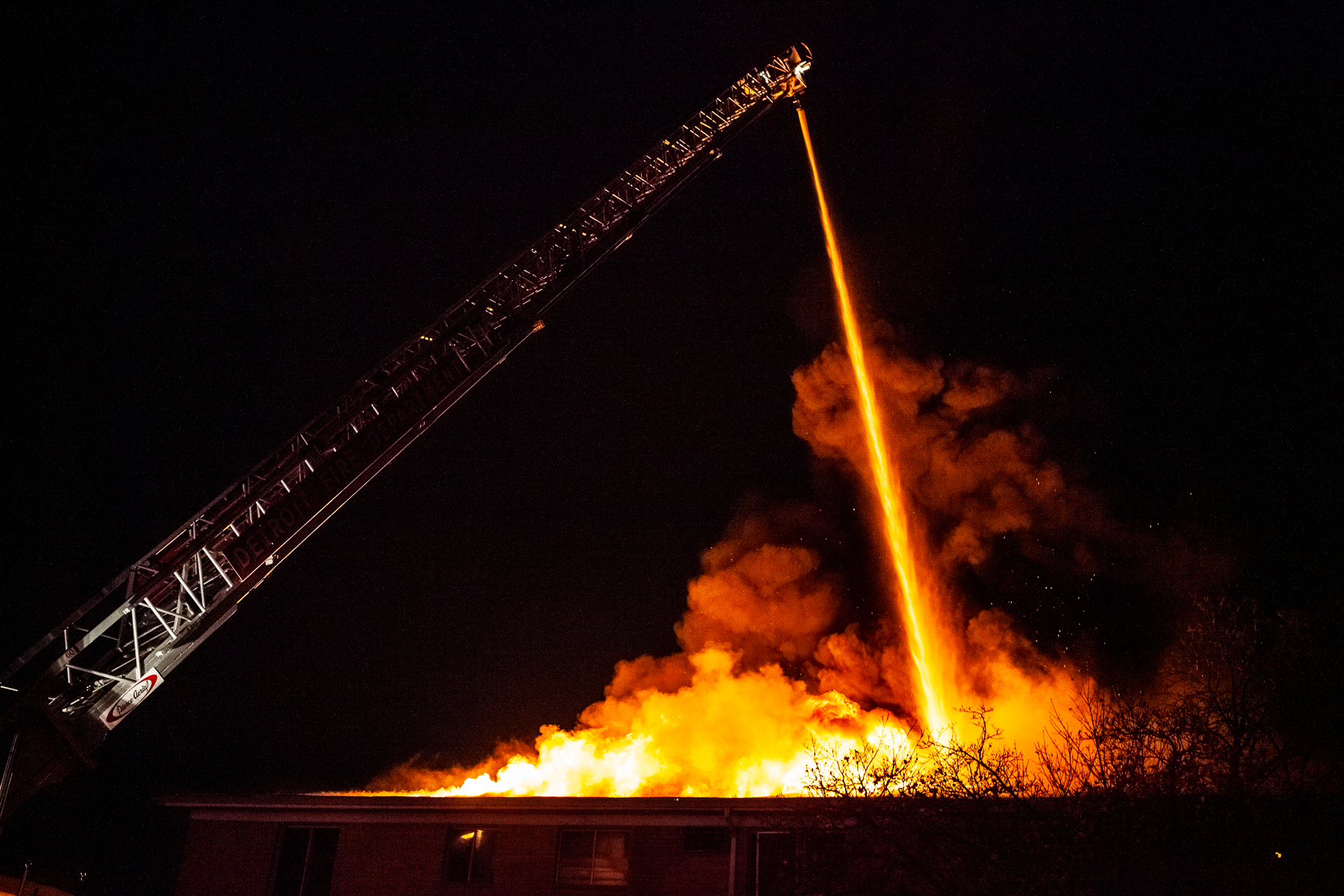 Detroit firefighters work to extinguish a two-alarm fire in an apartment building in Detroit, Nov. 1, 2009. (© 2009 Eric Dietrich Photography)