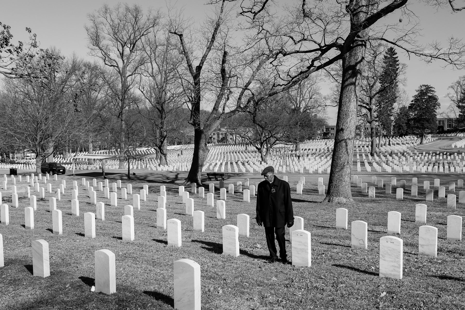 Armed Forces Retirement Home resident George Wellman, 73, looks at headstones in the U.S. Soldiers’ and Airmen’s Home National Cemetery in Washington, D.C., Feb. 8, 2018, following the funeral of fellow resident Edith Ellington. Ellington died Dec. 6, 2017, at the age of 93. She served in the Women’s Army Corps during World War II. Residents at the home pass away at the rate of about one a week. (© 2018 Eric Dietrich Photography)