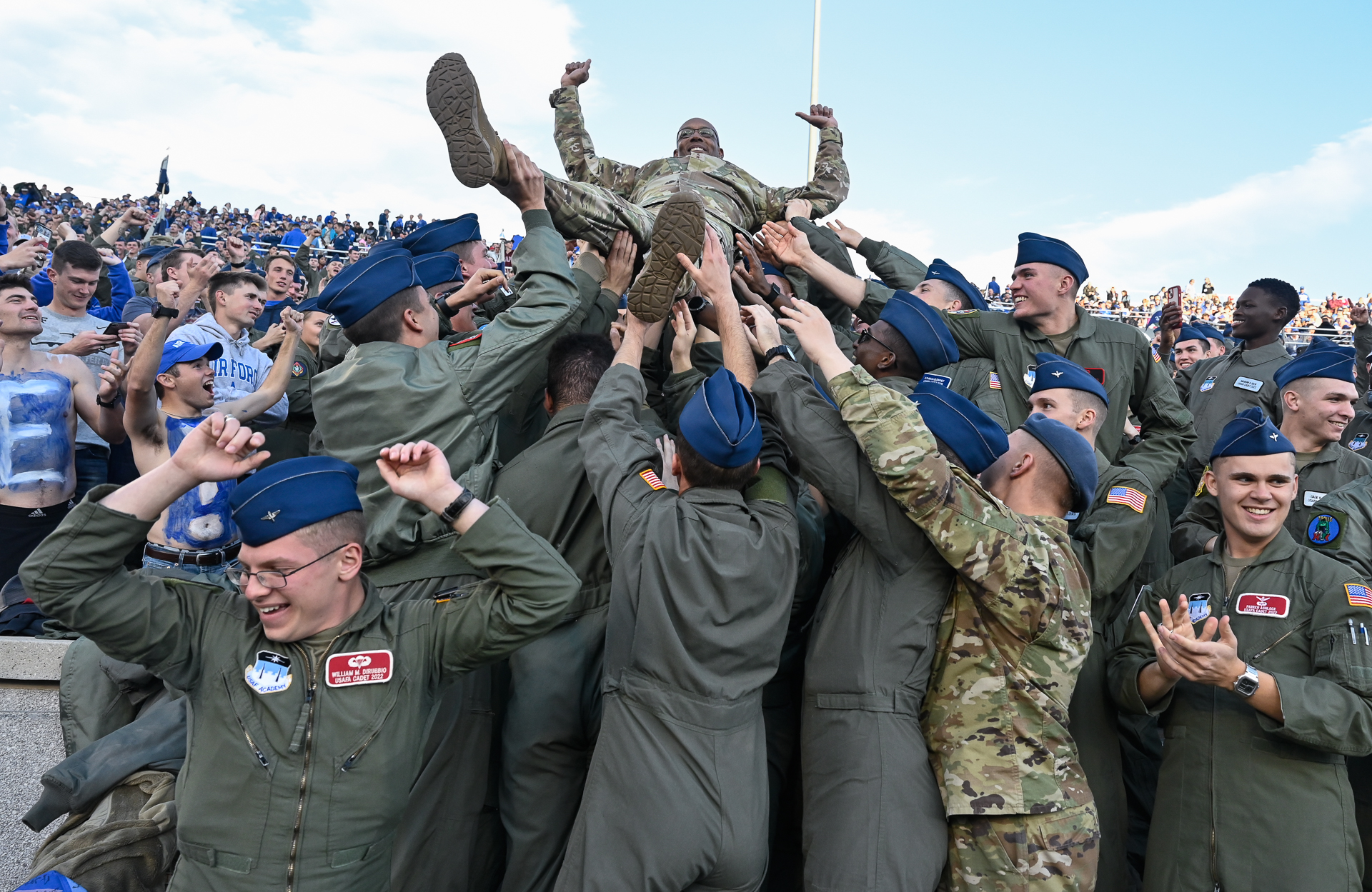 Air Force Chief of Staff Gen. CQ Brown, Jr. crowd surfs on cadets during the Air Force Academy versus San Diego State University football game at the academy in Colorado Springs, Colo., Oct. 23, 2021. San Diego won 20-14. (Eric Dietrich/U.S. Air Force)