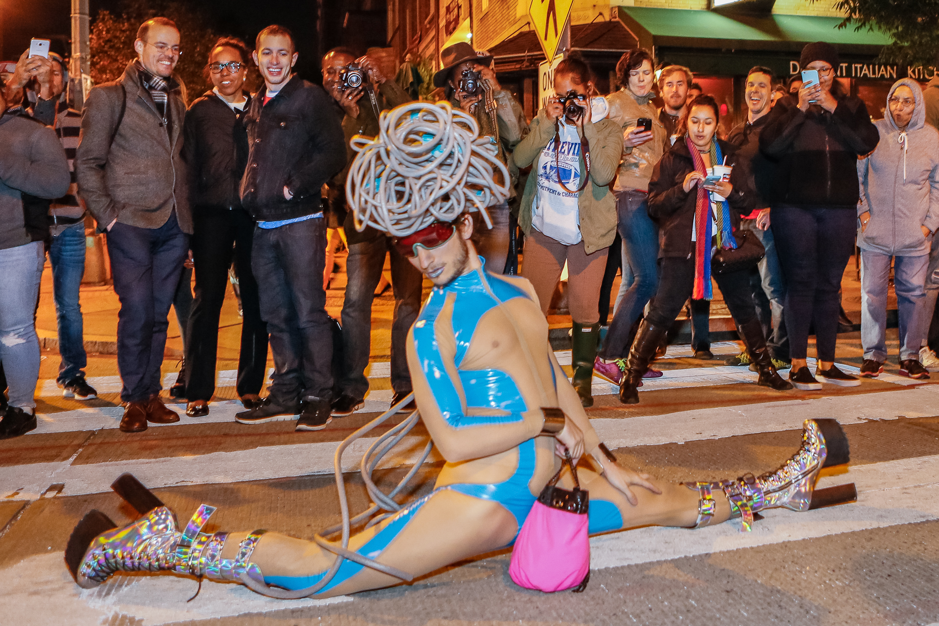 Spectators react as a race participant performs during the parade portion of the 17th Street High Heel Race in Washington, D.C., Oct. 25, 2016. The race features men dressed in drag racing down a short section of 17th St. (© 2016 Eric Dietrich Photography)