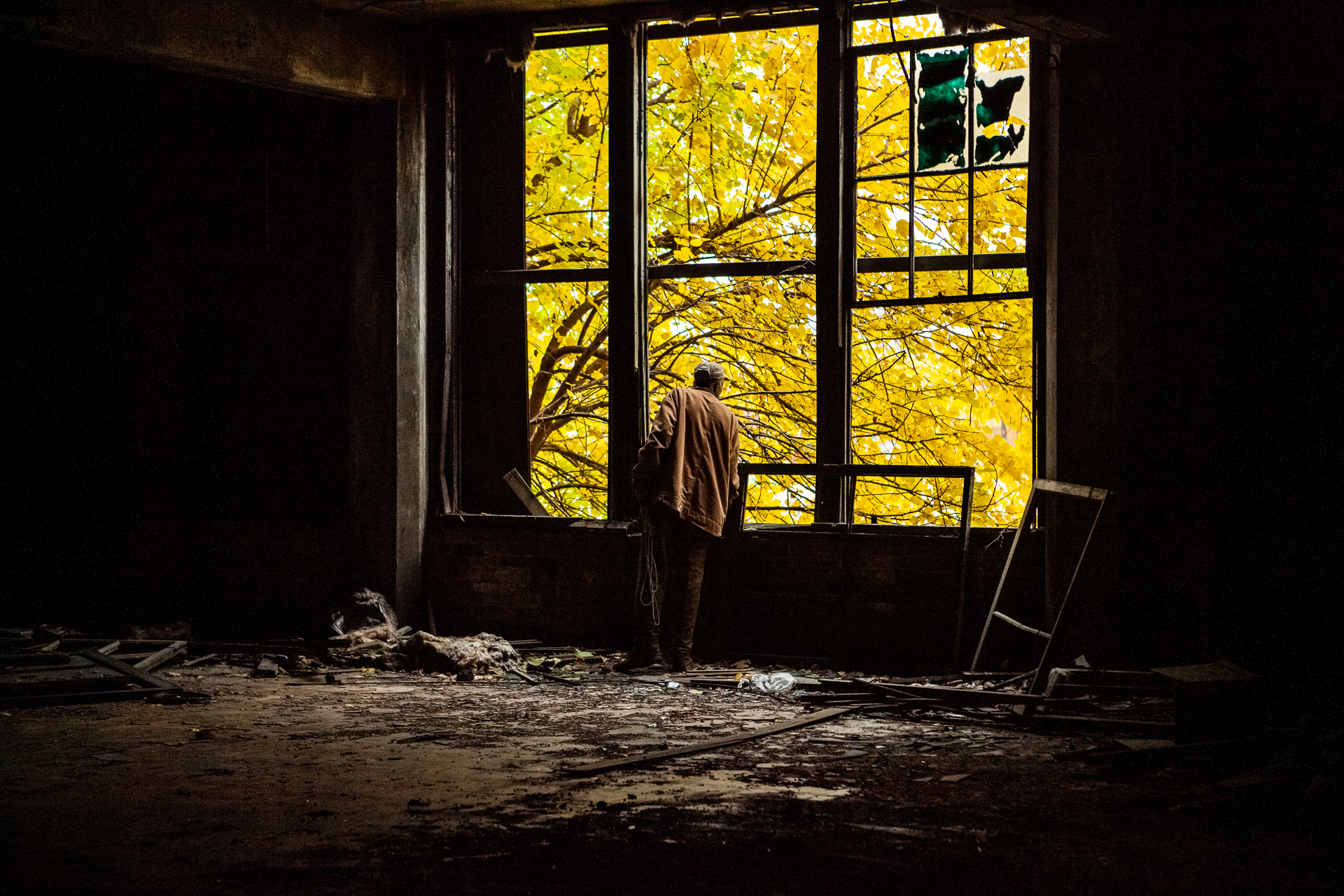 Local contractor Maurice William searches for metal window-counterweights in the abandoned Packard Automotive Plant in Detroit, Oct. 30, 2009. (© 2009 Eric Dietrich Photography)